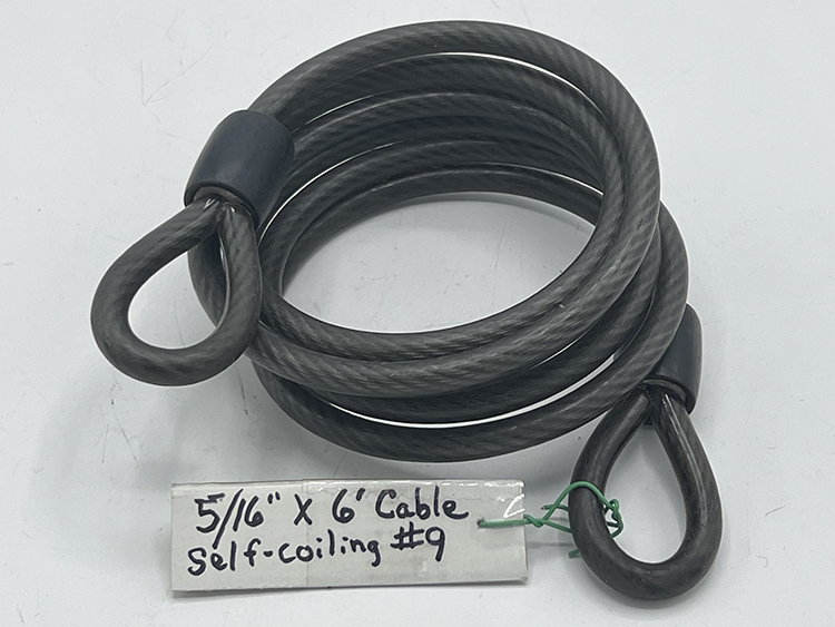Self-coiling bicycle security cable